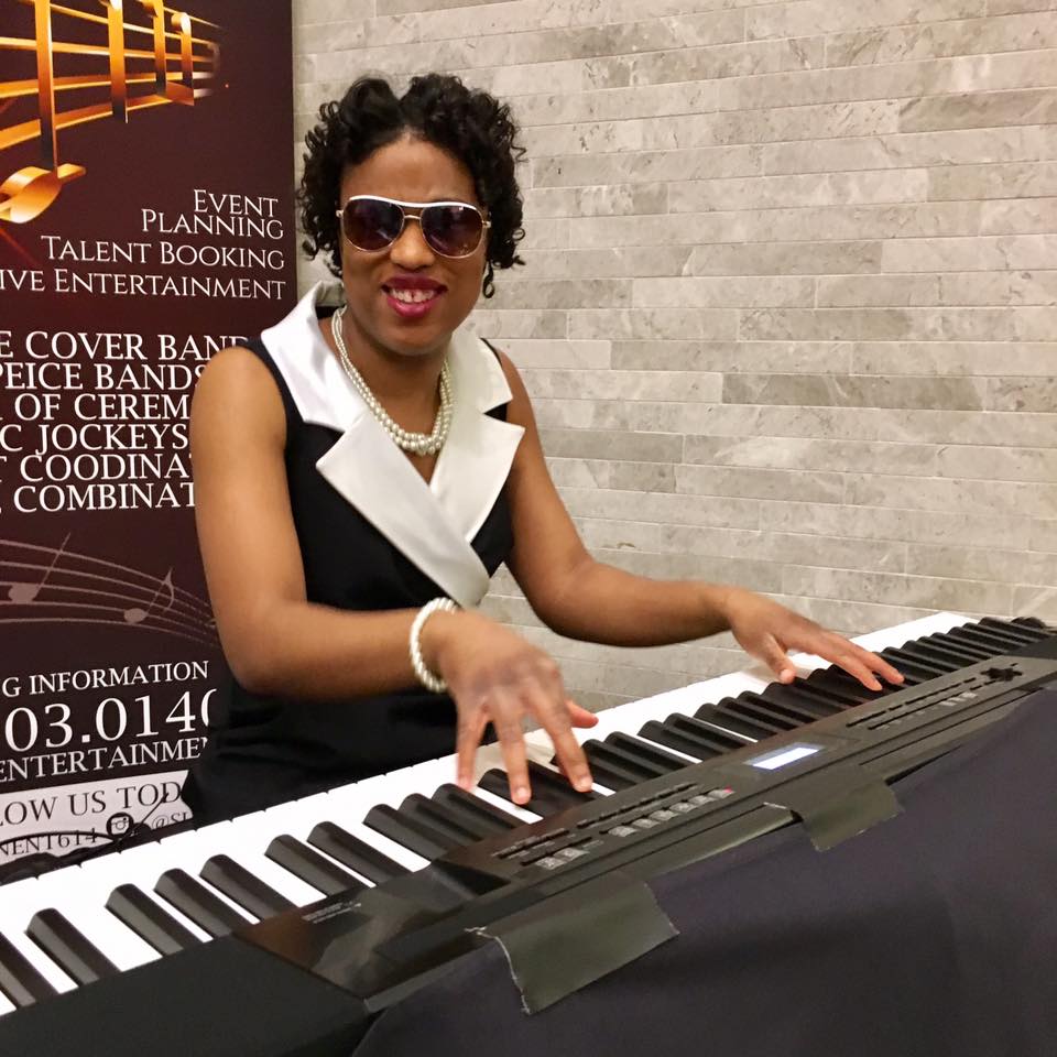 Genene Blackwell performs on the keyboard